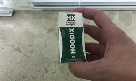 Внешний вид таблеток hoodix в руках